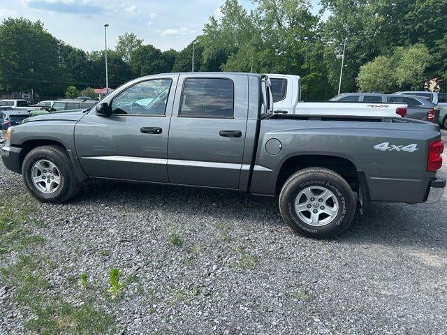 Used 2005 Dodge Dakota SLT with VIN 1D7HW48N55S295560 for sale in Newark, NY